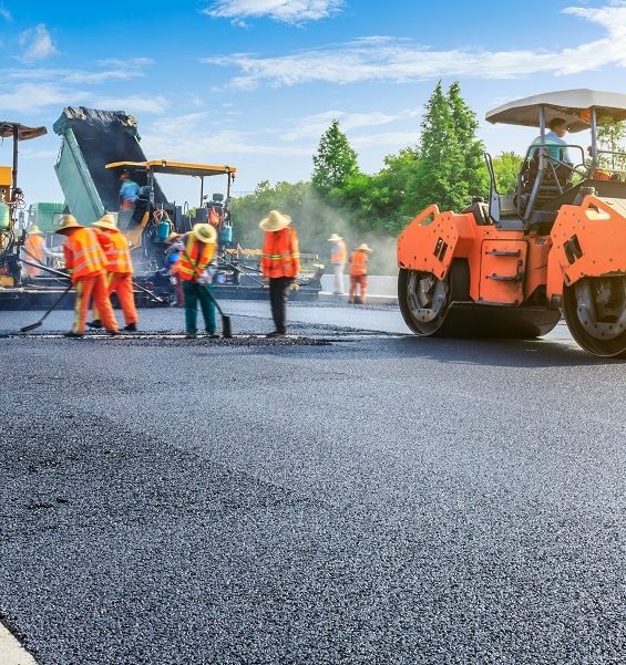 Construction,Site,Is,Laying,New,Asphalt,Road,Pavement,road,Construction,Workers
